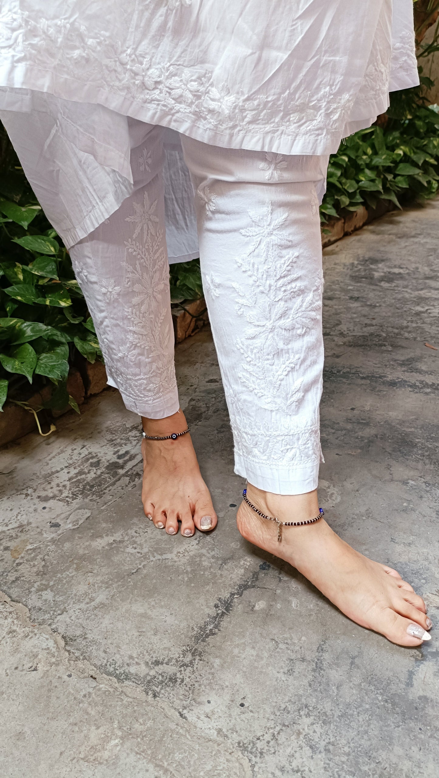 Gulmohar Orange peach mulmul kurti with white chikankari pant