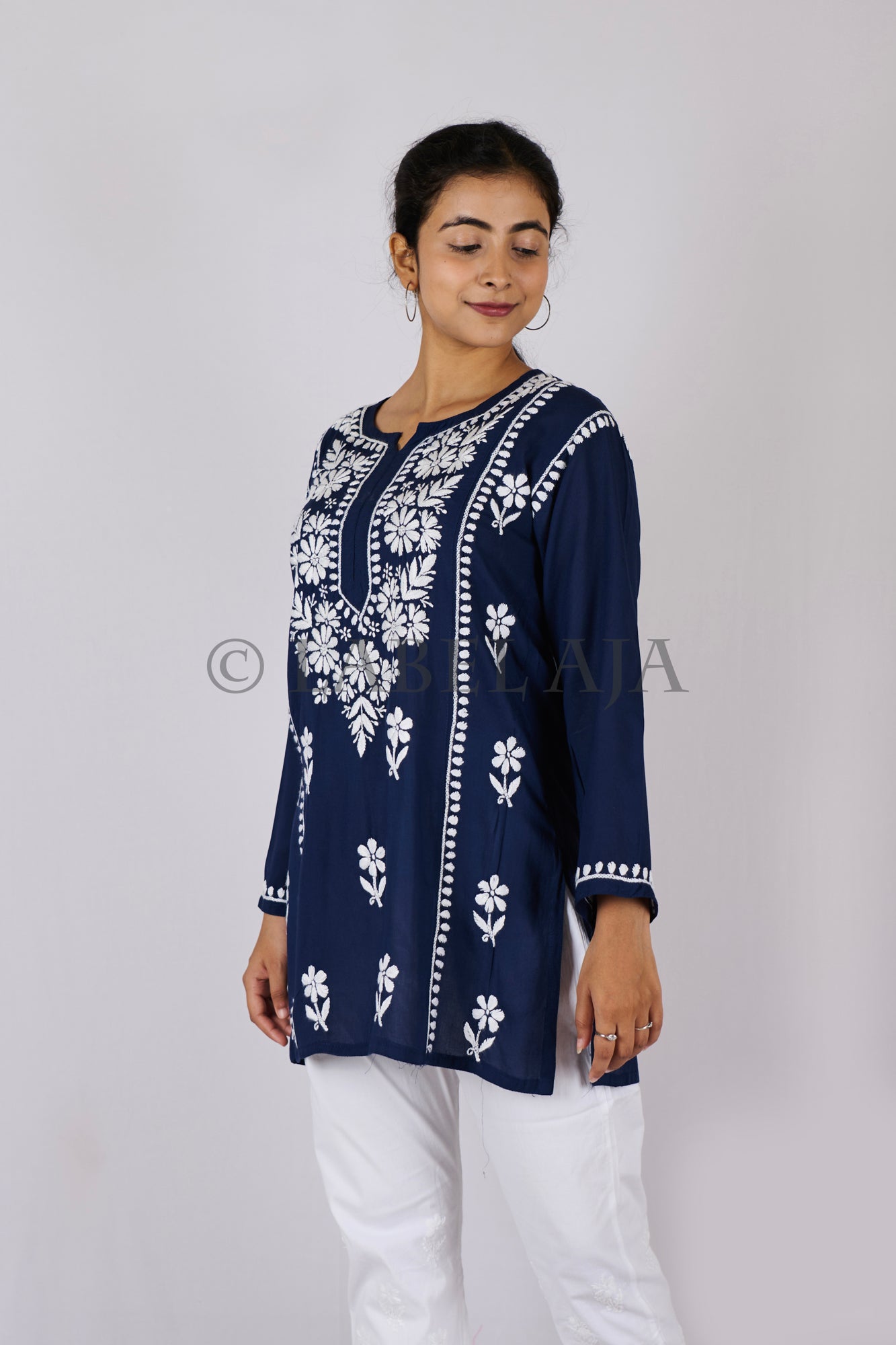 Inara modal chikankari short kurti